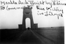 The arch was designed by architect Florestano Di Fausto in response to a request by the Italian Governor-General Italo Balbo. It was unveiled on 16 March 1937 in a lavish night ceremony attended by Benito Mussolini.   it was demolished by dynamite in 1973