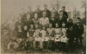 Her brother (Joe) is front row, far right.  Photo c 1933