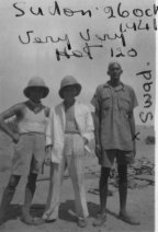 Man in Centre - Ernie Ward from London - the Squadron cook. Man on right - Sward - a local Sudanese who used to work in the camp.